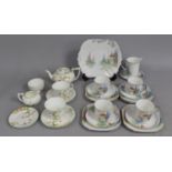 A Shelley Art Deco Tea Set decorated with Garden Scene having Foxgloves and Urn of Flowers