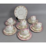 An Edwardian Tea Set with Floral Garland and Pink Trim Border to comprise Cups, Saucers, Side Plates