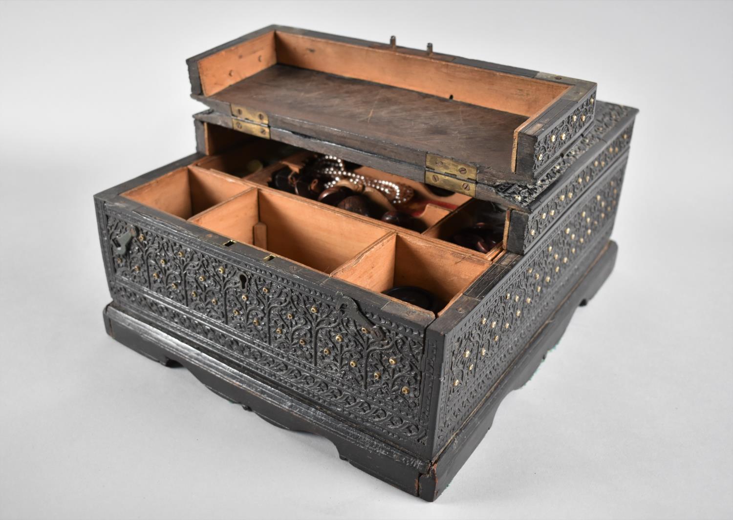 A 19th Century Anglo-Indian Colonial Work/Sewing Box with Intricately Carved Geometric and Floral