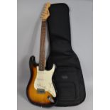 A Fender Squier Stratocaster Electric Guitar, Tobacco Sunburst with Carry Case