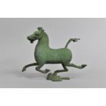 A Green Patinated Bronze Study of the Flying Horse of Gansu, 20cms Long