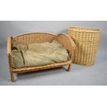 A Modern Wicker Pet Bed, 84cms Wide and an Oval Linen Basket, 58cms High