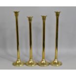 Two Pair of Tall Brass Candlesticks, 56.5cms and 52cms High