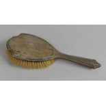 A Silver Mounted Dressing Table Brush