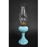 An Edwardian Opaque Blue Glass Oil Lamp with Moulded Dolphin Decoration in relief to Base, with