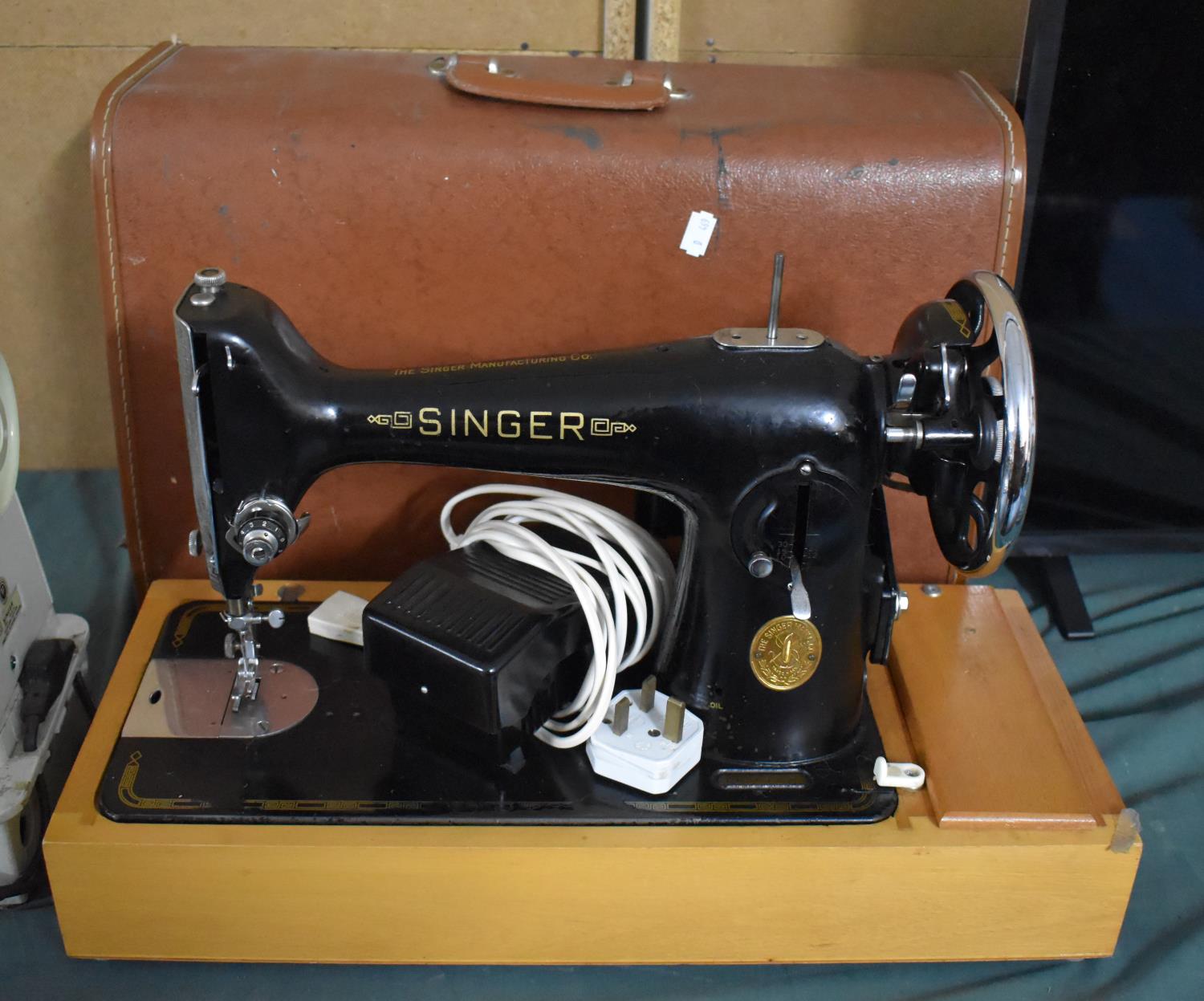 A Singer Electric Sewing Machine with Pedal, Untested