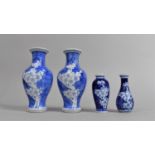 A Pair of Small Chinese Blue and White Prunus Pattern Vases, 15cm High Together with Two Miniature