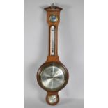 A Mid 20th Century Wheel Barometer with Thermometer by Comitti of London, 72cms High