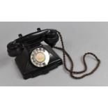 A Vintage Bakelite Telephone with Number Drawer
