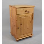 A Modern Pine Bedside Cabinet with Single Drawer over Cupboard Base, 46cms Wide