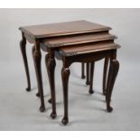 A Late 20th Century Mahogany Nest of Three Tables, 61cms Wide