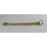 An Pair of Long Brass Tongs, Decorated in Relief with Figures, 34cms Long