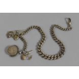 A Heavy Victorian Silver Watch Chain, Graduated Curb Links and with Silver Maritime T Bar Charm