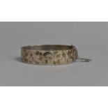 A Heavy Vintage Silver Hinged Bangle with Etched Foliate Decoration, Birmingham 1966, 48.8gms