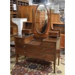 An Edwardian String Inlaid Walnut Dressing Chest with Oval Glass, 112cms Wide