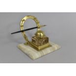 An Early 20th Century French Brass and Onyx Novelty Desktop Ink and Pen Stand, The Glass Inkwell