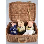 A Vintage Wicker Picnic Basket containing Vintage Novelty Piggy Banks to include Wade