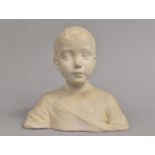 A Parian Bust of a Young Boy, 17cms High