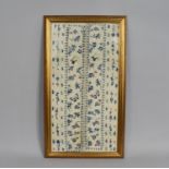 A Framed Chinese Embroidered Silk Panel Textile Depicting Butterflies and Flowers, 29x56cms