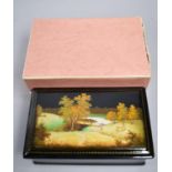 A Russian Lacquered Box Decorated with Wooded Landscape and Bridge, 16.5cms Wide