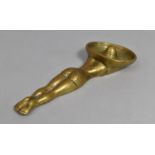A Novelty Brass Ashtray in the Form of Reclining Female with Sombrero, 17.5cms Long