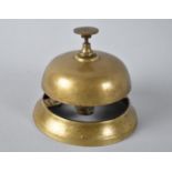 An Edwardian Brass Reception Counter Bell, 11cms Diameter