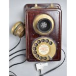 A Reproduction Wall Hanging Brass Mounted Telephone, 20cms High