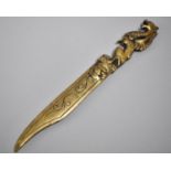 A Novelty Brass Letter Opener with Welsh Dragon Handle, 24cms Long