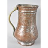 A Persian Copper Tankard with Engraved Decoration of Traces of Original Silver Plate, having Brass