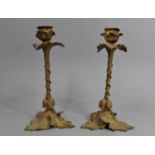 A Pair of Gilded Bronze Candlesticks, 24cms High