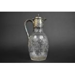 An Edwardian Silver Plated and Etched Glass Claret Jug, 25cms High