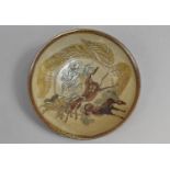 A Glazed Stoneware Bowl decorated with Galloping Horses, 23.5cms Diameter