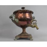 A Late Victorian Copper and Brass Two Handled Samovar with Tap, 42cms High