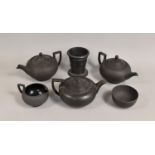 A Collection of Various Wedgwood Basalt Items to comprise Relief Vase, teapots, Bowl, Jug Etc (