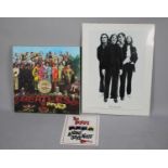 Three Beatles Wall Decorations to Include 'Beatles 1970' Poster, 'Sgt. Peppers Lonely Hearts Club