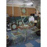 A Wrought Iron Four Piece Garden Patio Set weathered Condition and One Chair in need of Some