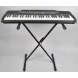 A Casio Keyboard, CTK520L, with Stand but no Transformer