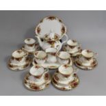 A Royal Albert Old Country Roses to comprise Teapot, Eight Cups, Six Saucers and Side Plates, Cake