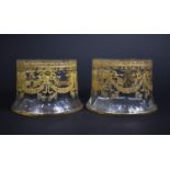 A Pair of Circular Glass Dressing Table Powder Pots Decorated with Swags and Bows in Gilt Enamels,