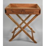 A Reproduction Butlers Tray on Stand, Inscribed for Moet and Chandon and Verve Clicquot Champagne,