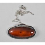A Silver and Amber Pendant on Chain