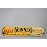 A Reproduction Cast Metal Guinness Extra Stout Sign, 56cms Wide