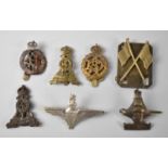 A Collection of Military Cap Badges to include Army Veterinary Corps, Pioneer Corps. Parachute,