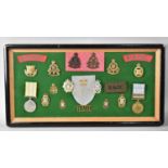 A Framed Collection of Royal Army Ordnance Corps Badges, Medals Etc