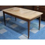 A 1970s Extending Dining Table on Square Tapering Supports, 207x86cms Max