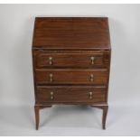 A Mid 20th Century Fall Front Bureau with Tooled Leather Writing Surface to hinged Flap, Three
