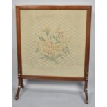 An Edwardian Mahogany Framed Embroidered Silk Fire Screen, 72x92cms