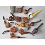 A Collection of Carved Wooden and Novelty Pipes and Pipe Bowls