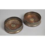 A Pair of Mid 20th Century Silver Plated Bottle Coasters with Pierced Decoration, 13cms Diameter