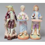 A Collection of Three Continental Figural Ornaments, all with Condition Issues